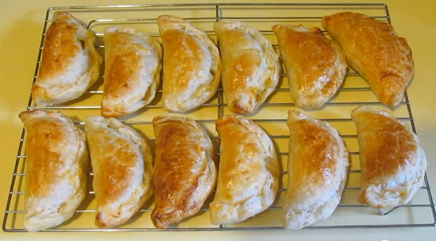 A tray of pumpkin pasties cooling down.